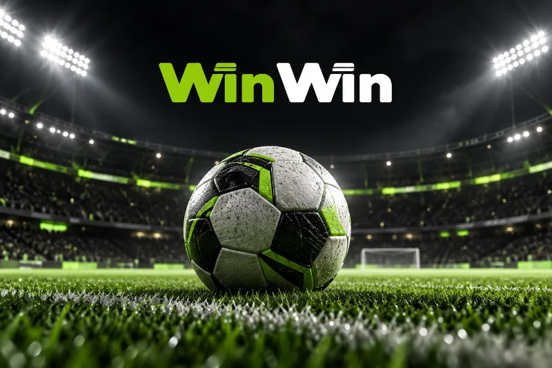 Football on a stadium pitch with the WinWin logo